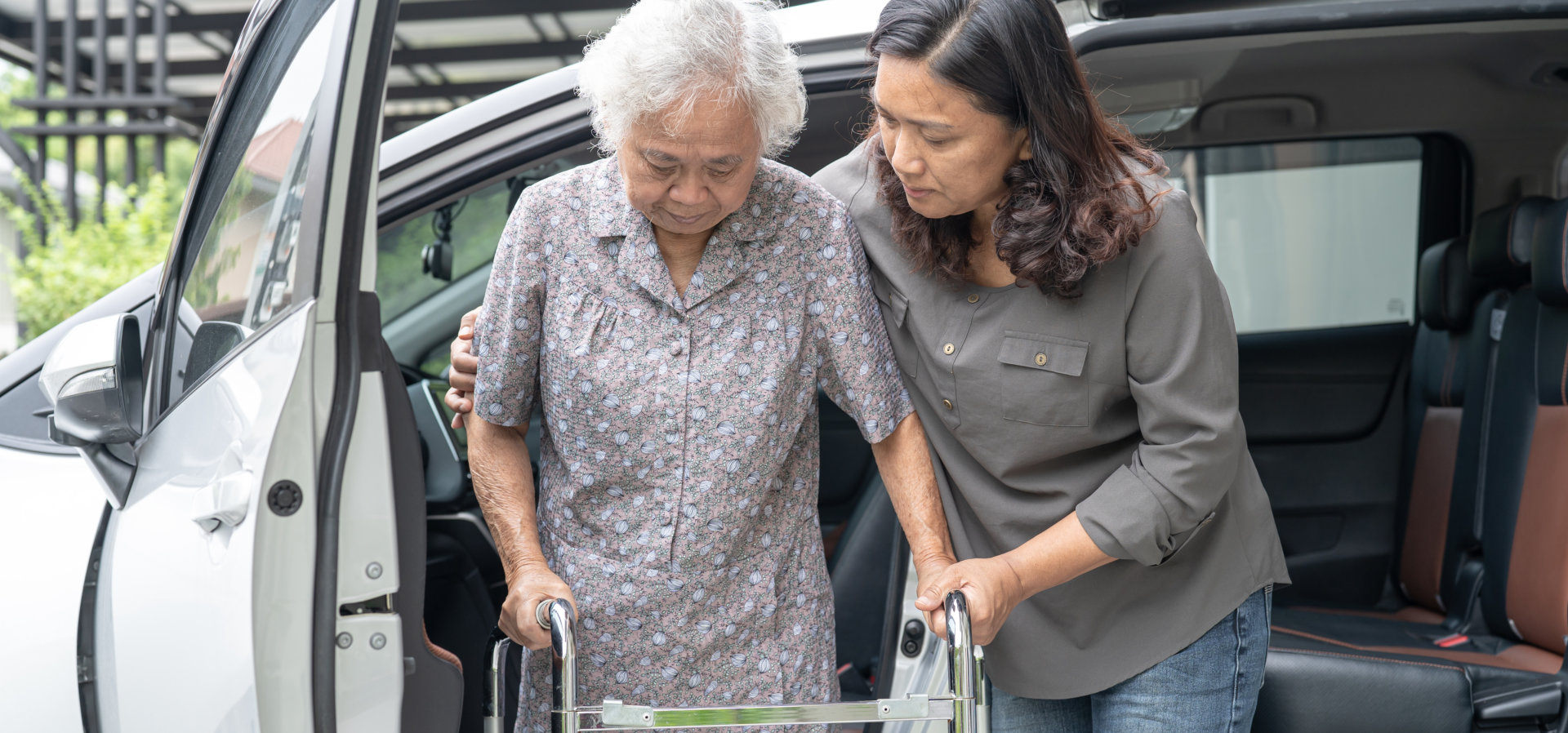care taker happily teaching elder